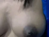 Squeezing Milk Out of Her Dark Nipples on Webcam